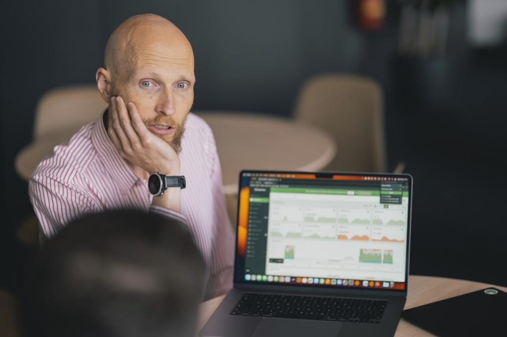 man pondering challenges of working remotely